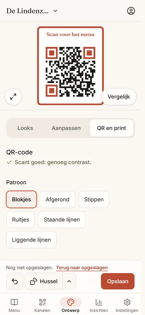 De QR-opties op de pagina Ontwerp: een QR-code met de hoeken in de merkkleur en een kader met label, de melding Scant goed en de patronen om uit te kiezen.